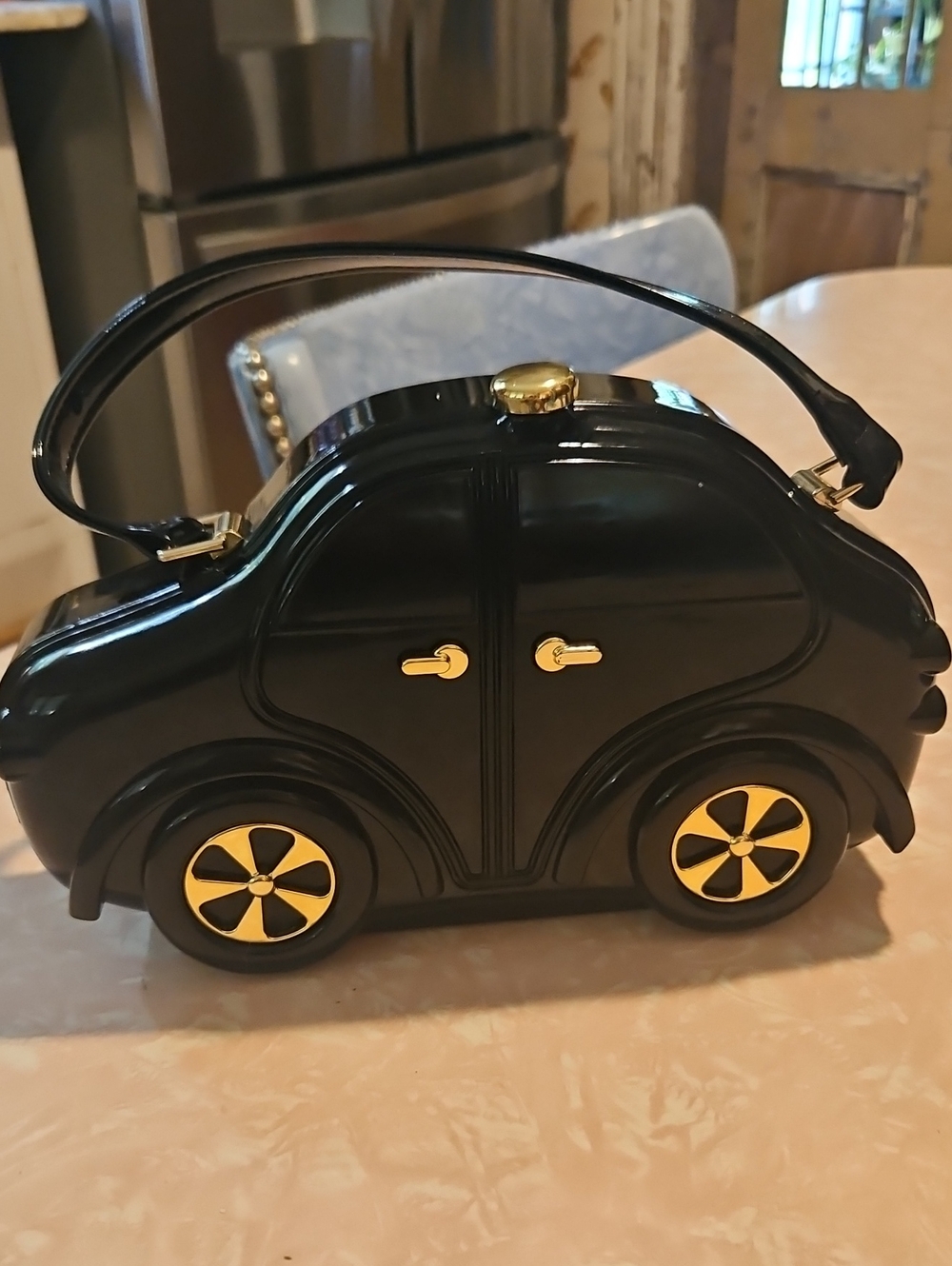 Black Novelty Car-Shaped Handbag with Gold Accents